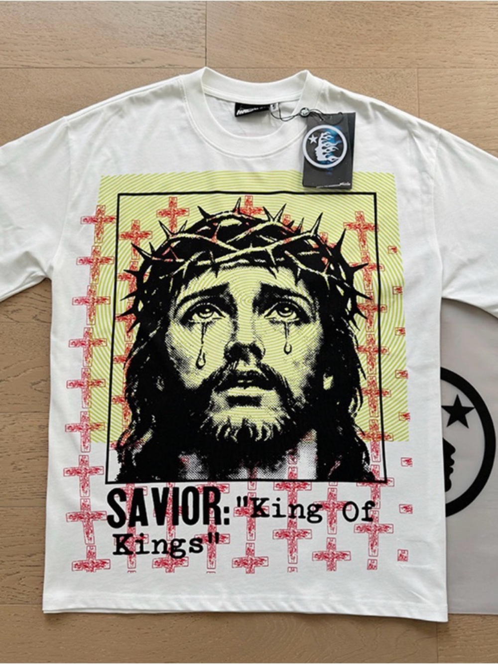 White Graphic Short Sleeve Tee with Yellow, Black & Red Artwork
